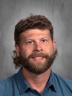 A portrait of Nicholas Chaney, Transportation Manager